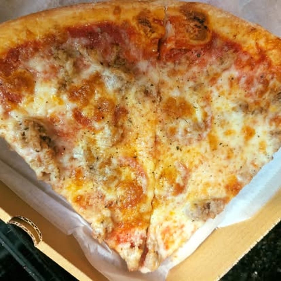 Cheese pizza slice.