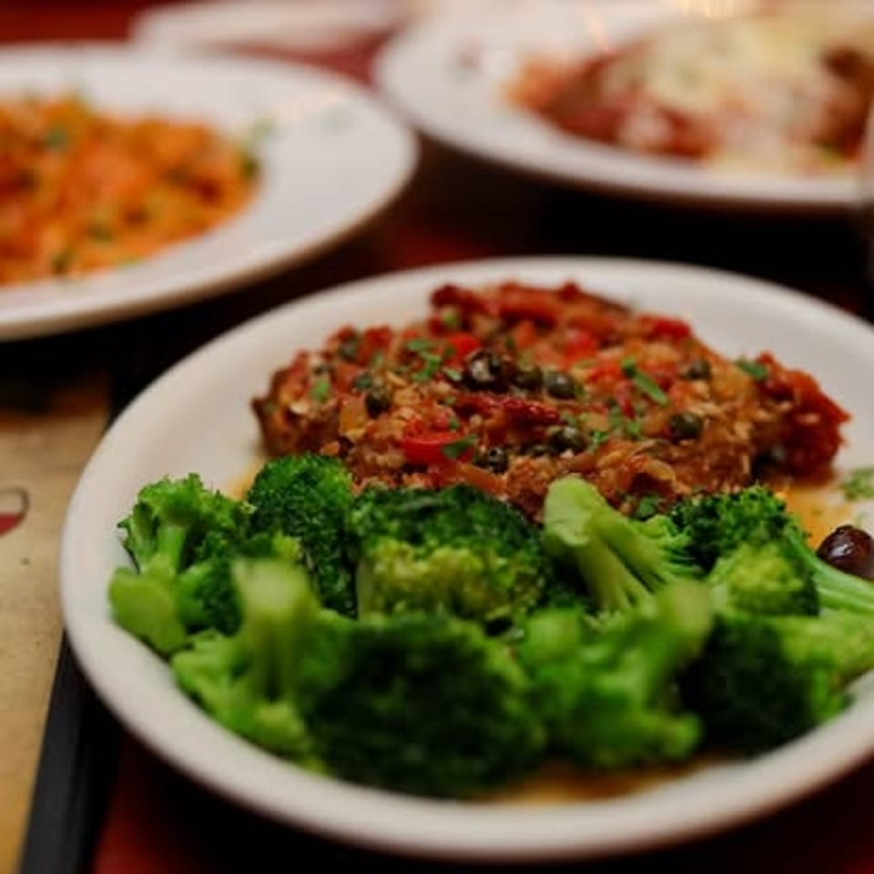 Entree served with broccoli.