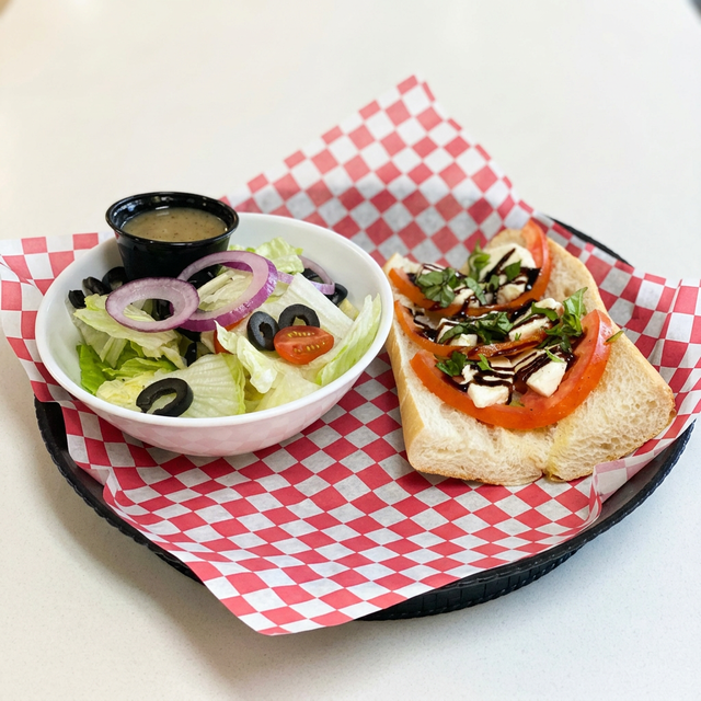 1/2 Sandwich w/ Soup or Salad.